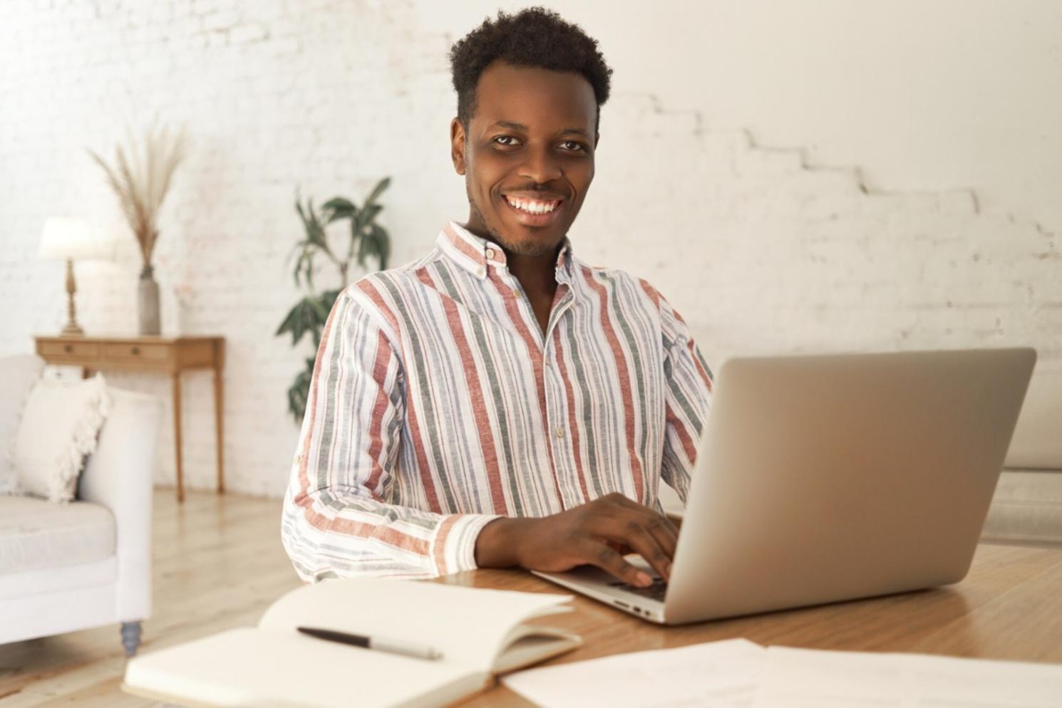 Confident business owner reviewing successful financial planning results