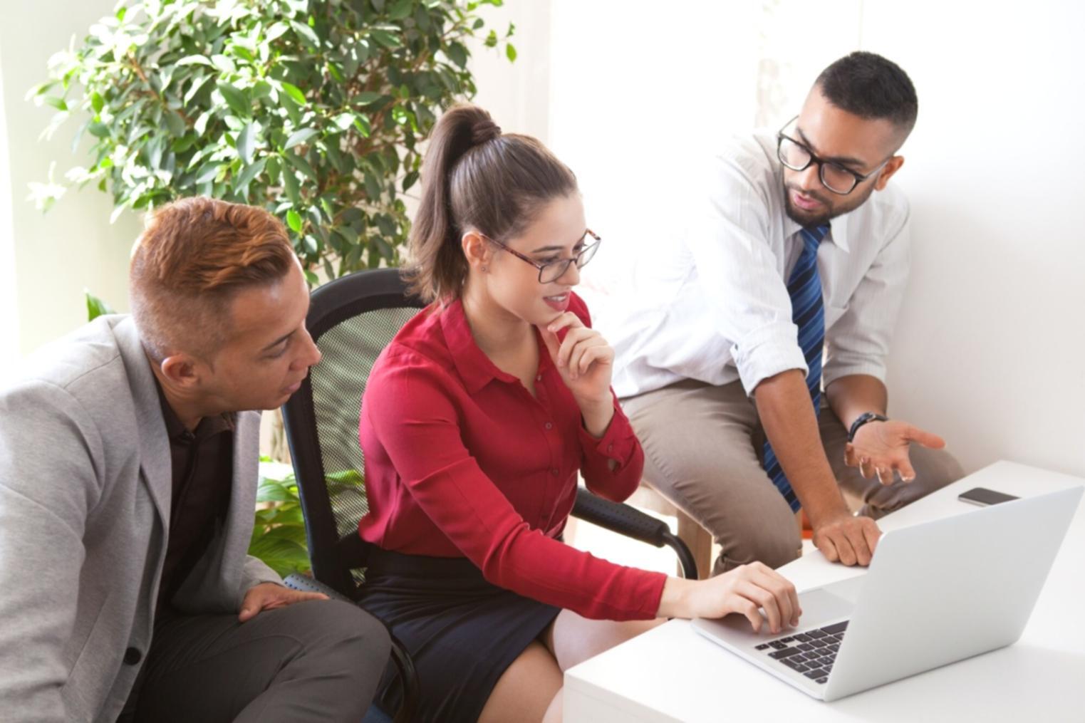 Business professionals in a training session discussing cash flow strategies